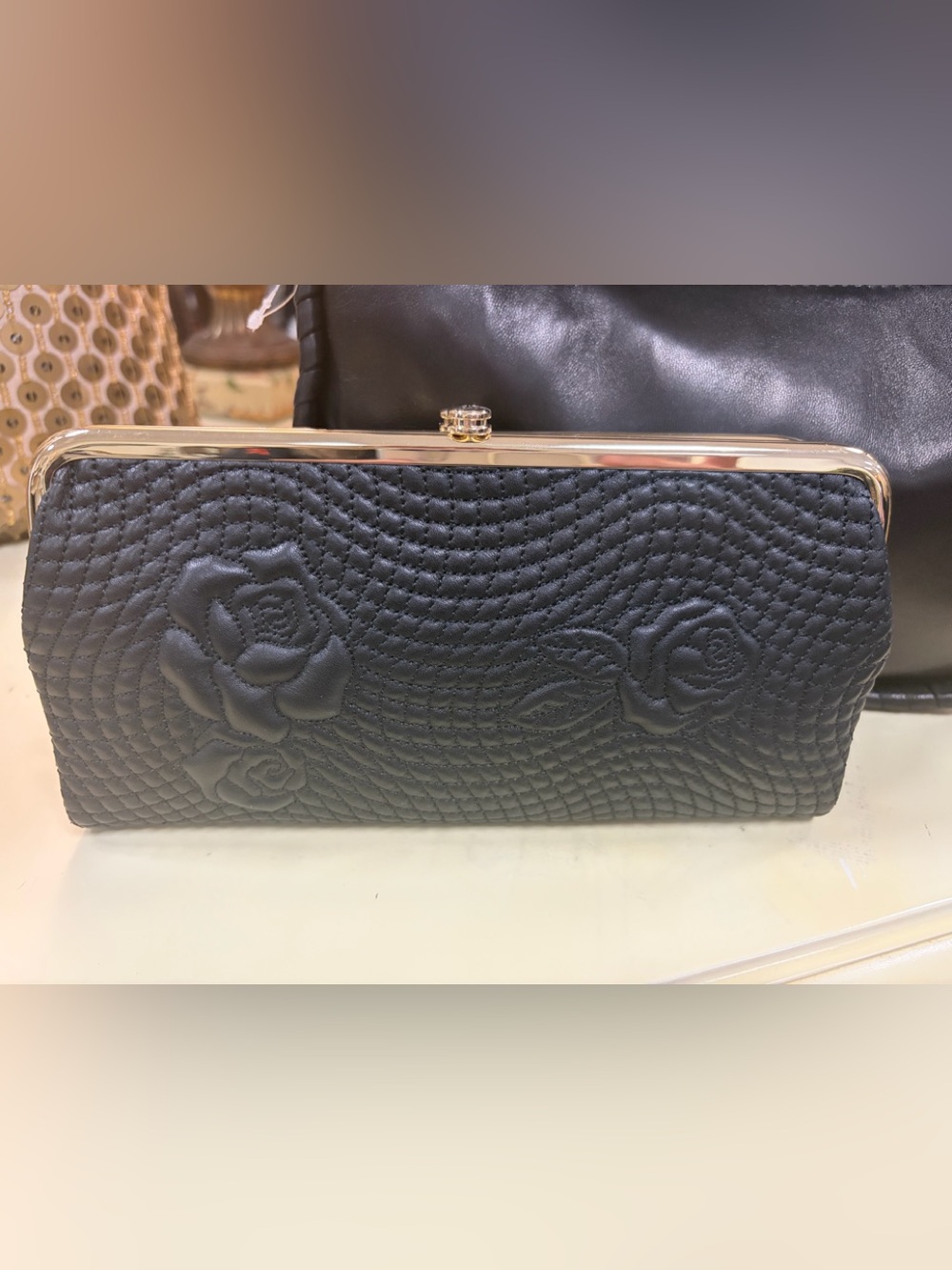 HOBO Black Quilted Rose-Embossed Frame Clutch with Gold-Tone Trim